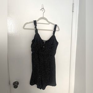 Black romper with white polka dots (Size M) good condition